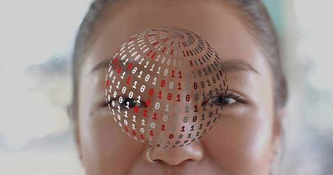 Closeup portrait chinese woman wearing silver hoop nose ring with holographic binary orb