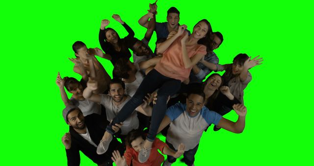 Diverse group of friends celebrating together with green screen background - Download Free Stock Images Pikwizard.com