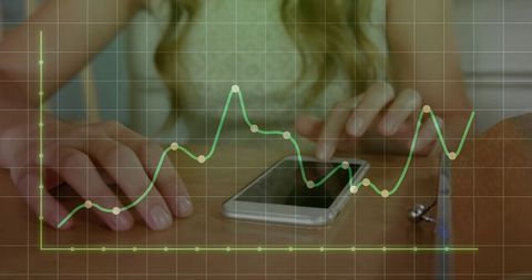 Woman Analyzing Data on Smartphone and Laptop with Graph Overlay