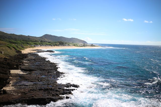 Scenic Coastal Landscape with Rocky Shore and Clear Blue Ocean - Download Free Stock Photos Pikwizard.com