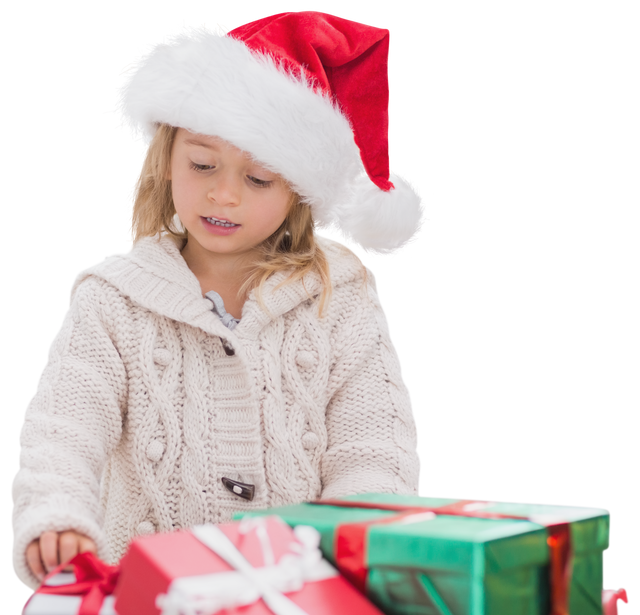 Caucasian Girl with Christmas Hat Unwrapping Presents on Transparent Background - Download Free Stock Videos Pikwizard.com