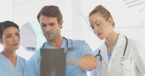 Medical Professionals Analyzing Patient Chart with Digital Interface Overlay