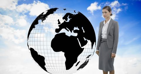 Thoughtful Businesswoman Standing Beside Globe - Download Free Stock Images Pikwizard.com
