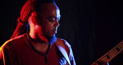 Electric Guitarist Performing on Stage in Low Light - Download Free Stock Images Pikwizard.com