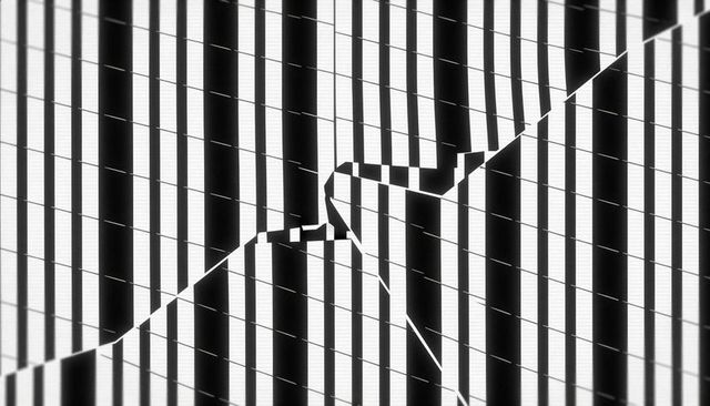 Cracked monochrome display panel macro with vertical stripes, pixel grid and diagonal fracture