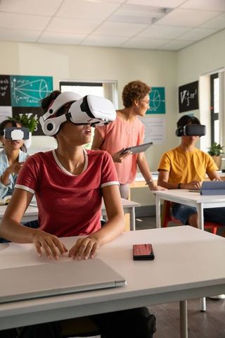 Students Experiencing Virtual Reality in Modern Classroom