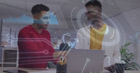 Professionals Analyzing Data in Futuristic Office Setting