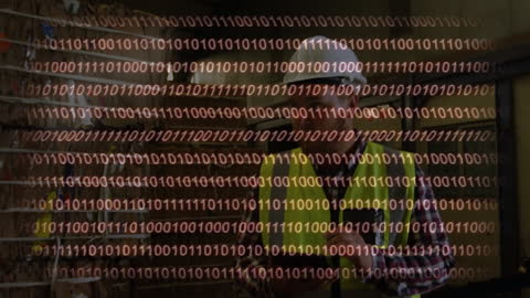 Digital Binary Overlay on Warehouse Worker with Tablet