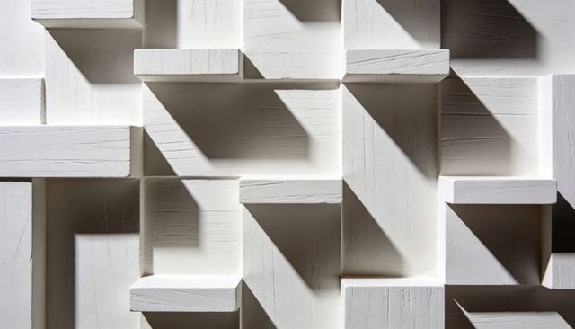 3D white wooden block relief panel casting diagonal shadows, geometric texture