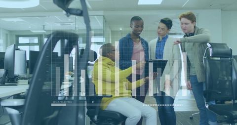 Business Team Analyzing Financial Data on Tablet in Modern Office