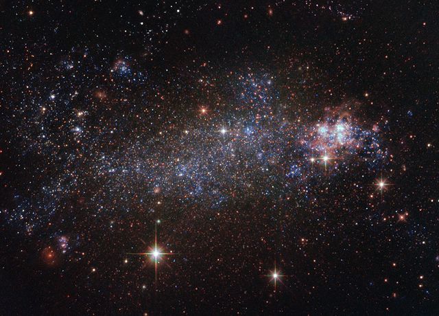 NGC 5408 Irregular Galaxy Seen by Hubble in Centaurus Constellation - Download Free Stock Photos Pikwizard.com