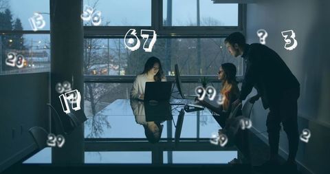Team Working Late with Digital Numbers Overlay - Download Free Stock Images Pikwizard.com