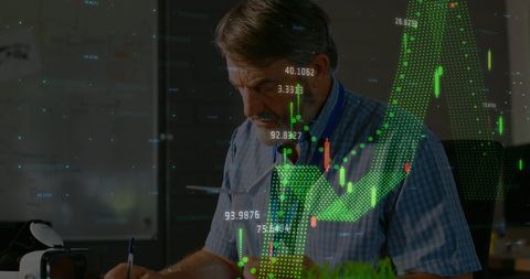 Businessman analyzing financial data with digital stock market interface