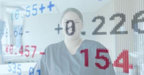 Nurse examining digital health metrics overlay in hospital room