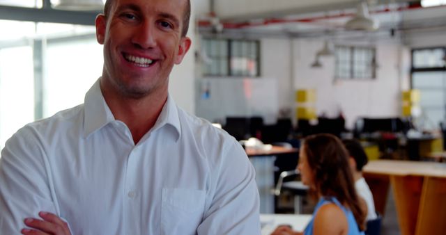 Confident Businessman Standing in Modern Open Plan Office - Download Free Stock Images Pikwizard.com