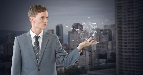 Businessman Holding Digital Globe in Urban Background - Download Free Stock Images Pikwizard.com