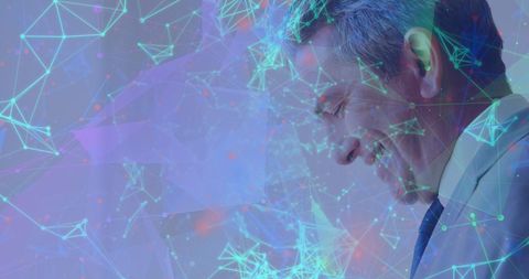 Middle-Aged Businessman Analyzing Digital Data Graphics