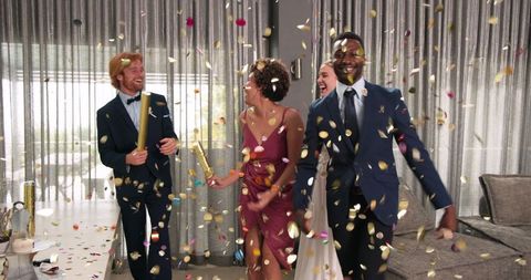 Joyful Wedding Celebration with Friends and Confetti