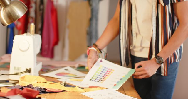 Fashion Designer Reviewing Color Palette in Studio - Download Free Stock Images Pikwizard.com