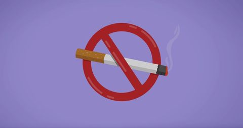 Smoking ban symbol on pale purple background