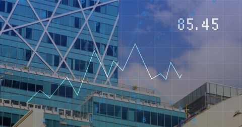 Modern Business Building Featuring Digital Stock Graph Overlay