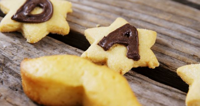 Star Shaped Cookies with Chocolate Letters on Rustic Wood Surface - Download Free Stock Images Pikwizard.com