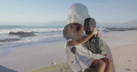 Romantic couple relaxing beachside with reflective portrait overlay
