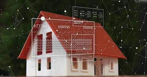 Digital Interface Over Miniature House Model with Data Visualizations