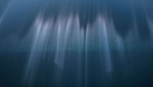 Cascading Deep Blue Teal Light Shafts with Mist, Particle Glow and Atmospheric Haze