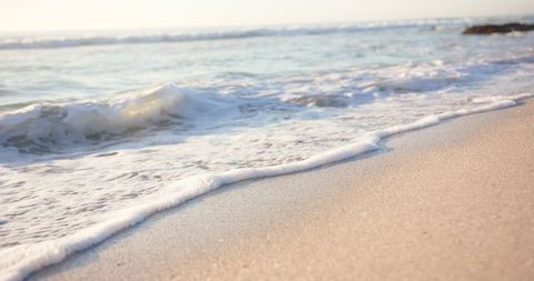 Serene Waves Caressing Pristine Beach at Sunrise - Download Free Stock Images Pikwizard.com