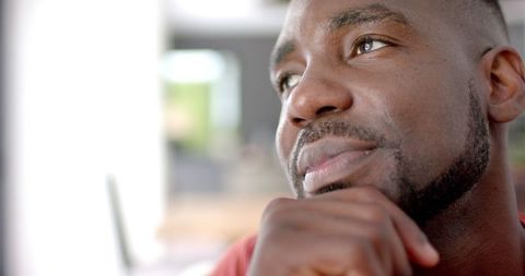 Contemplative african american man thinking at home