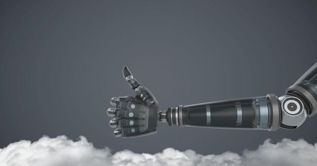 This image depicts a robotic hand giving a thumbs up gesture above clouds, set against a grey background. Ideal for use in technology blogs, AI and robotics articles, innovation presentations, and futuristic design projects.