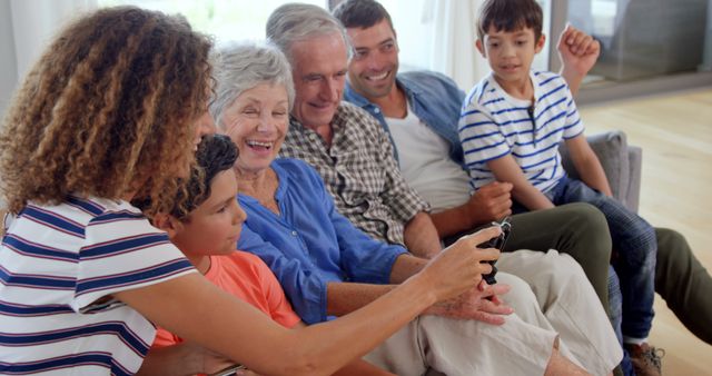 Multigenerational Family Enjoying Time Together on Sofa - Download Free Stock Images Pikwizard.com