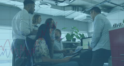 Diverse Business Team Analyzing Data Graphs in Modern Office