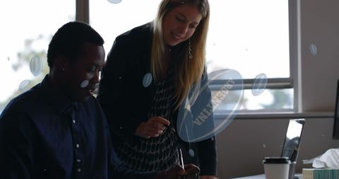 Diverse Business Team in Creative Discussion with Digital Overlay