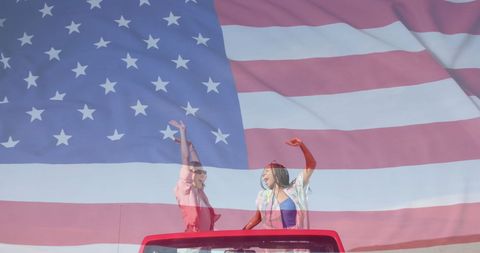 Celebrating Freedom: Diverse Women Enjoy Summer Drive with USA Flag