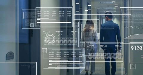 Executives walking modern office corridor with futuristic holographic interface overlays