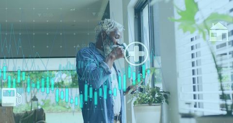 Senior African American Man Using Smartphone Amid Digital Financial Graphics