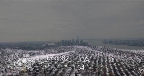 Digital data mesh hovering over urban skyline with numeric holographic overlay, aerial