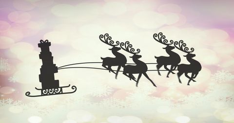 Silhouette of Reindeer Pulling a Gift-Laden Sleigh