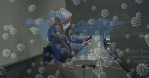 Elderly man navigating airport with covid-19 precautions amid pandemic