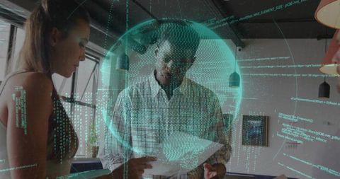 Data analyst reviewing documents with holographic interface