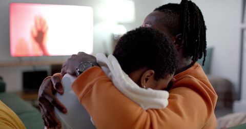 Couple Sharing Intimate Embrace in Living Room Comfort
