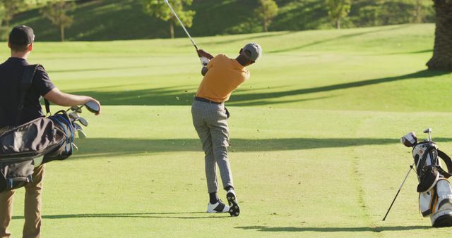 Image of diverse male friends playing golf on golf field - Download Free Stock Photos Pikwizard.com