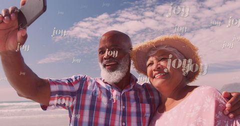 Happy Senior Couple Taking Selfie on Beach