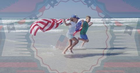 Children Running on Beach with American Flags Celebrating Patriotism
