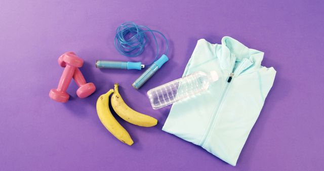 Fitness Gear With Dumbbells, Bananas, and Water Bottle on Purple Background - Download Free Stock Images Pikwizard.com