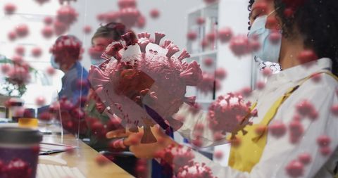 Office Workers Wearing Masks with Coronavirus Particles Overlay