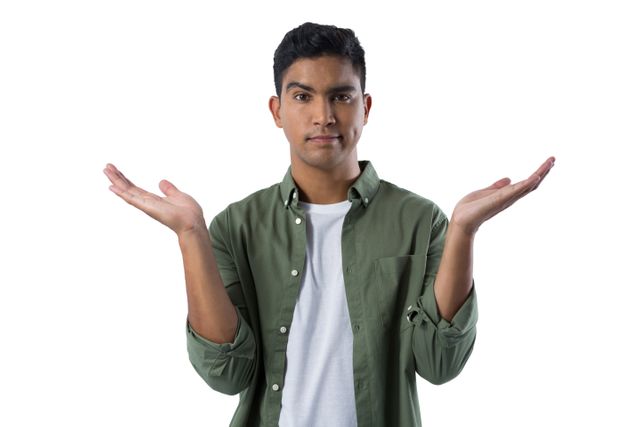Frowning man gesturing against white background - Download Free Stock Photos Pikwizard.com