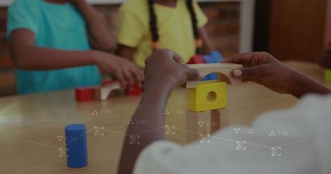 Children enhancing problem-solving skills with wooden blocks